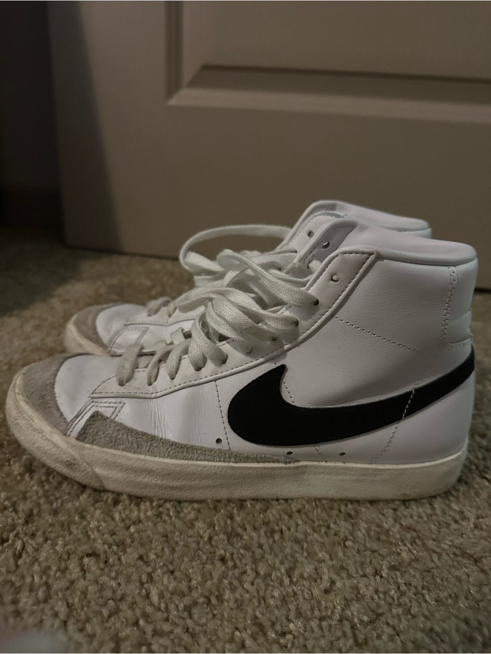 Nike High-Top Blazers Sneakers in White with Black Swoosh